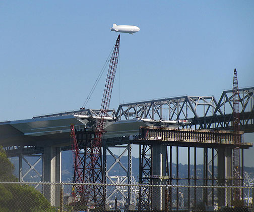 dirigible-over-new-and-old-baybridge_5237 Dirigible over new and old Bay Bridge from Treasure Island