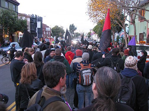 greek-demo-at-new-college_5618 Demonstrators in solidarity with the Greek Uprising pause at New College on Valencia Street in San Francisco, Dec. 20, 2008.