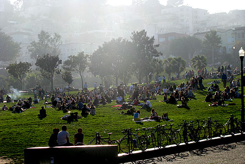 dolores-park-south_6202 Winter light pours over Liberty Hill onto sunbathing denizens on the slopes above 19th Street in Dolores Park, Jan. 17, 2009.