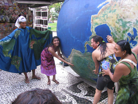 giant-globe-and-hippies_6590 This giant globe was carried along on the march, this photo taken about an hour after the rains had stopped.