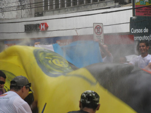 shaking-water-off-banner_6519 Many horizontal banners were sponges that needed repeated shaking and squeezing.