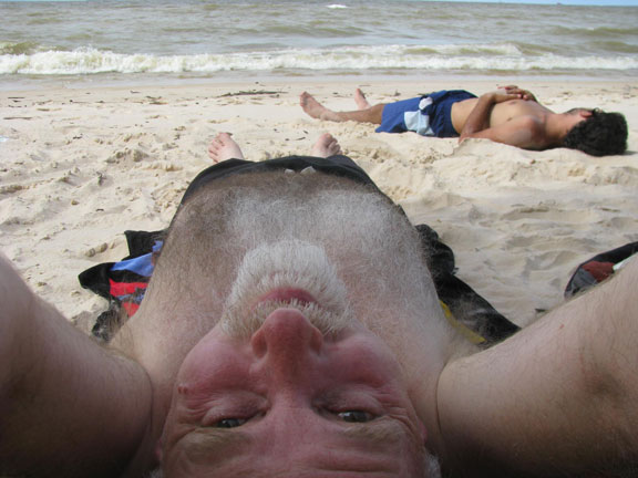 me-on-back-on-beach_7075 Joao Paolo asleep in background, as usual!