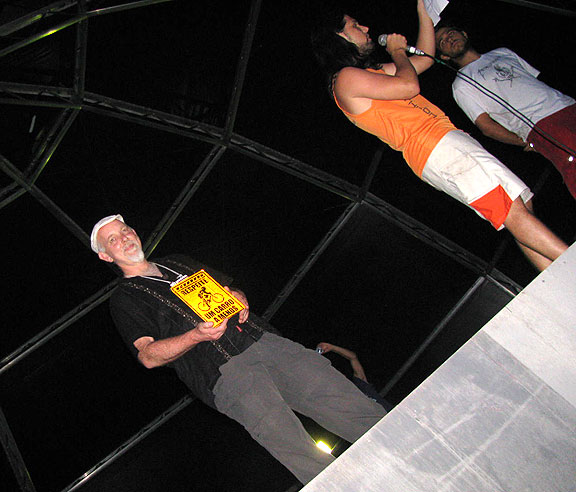 on-stage-diagonal_6998 In the darkness of the stage, adding our cyclist sensibilities to a long afternoon of speechifying.