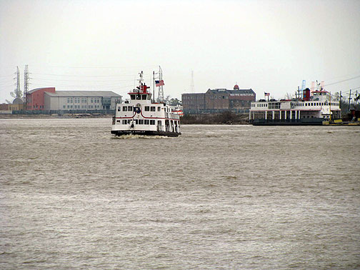 algiers-ferry-on-mississippi_7513 The Mississippi is just at hand, and the ferries still ply its waters amidst countless barges and freighters too.