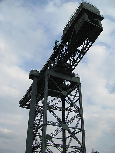 crane-from-below_8794 A crane along the River Clyde, no longer in use, now surrounded by hotels and gentrified condominiums.