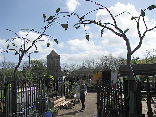 eastside-sculpture-w-church-cityview_8342 Looking back from the embankment, through the sculpture gate, towards the old church.