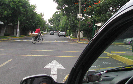 bici-panadero-in-road_1885 This bread delivery guy (bici panadero) was just ahead of us as we taxiied in to the Congress.