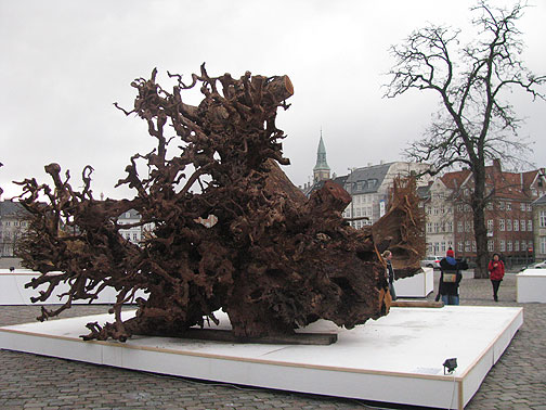 ghanian-stump_3500 A dozen massive hardwood stumps were brought from West Africa and installed as a Climate Change art exhibition in one of the city's main plazas.