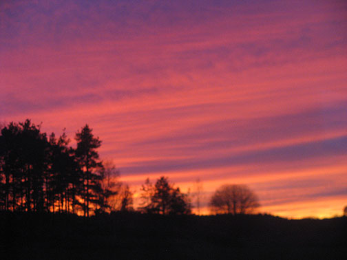 three-twenty-one-pm_3196 On the train from Oslo to Stockholm, we finally had clear skies. Towards the "end of the day" which is about 3:20 in this photo, we got this amazing sunset, which turns out to be somewhat typical of these days in Stockholm too. After seeing the Edward Munch museum in Oslo, and his famous painting The Scream, Adriana immediately tagged this view as the source of his inspiration...