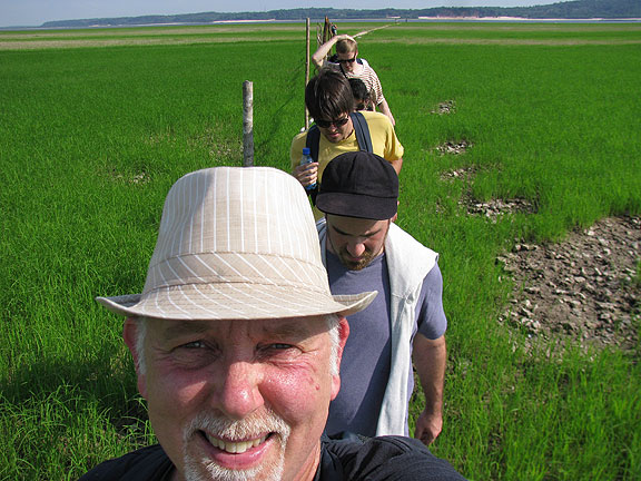 hiking-across-weird-grassy-dried-mud-of-river-bottom-42-degrees-C_0981