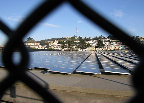 Grand-view-peak-Sutro-tower-solar-panels-on-sunset-reservoir-through-fence_2248