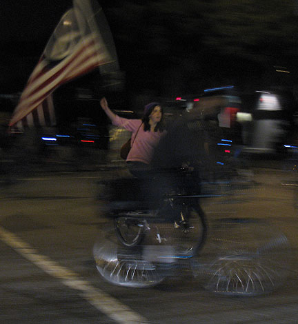 cm-jan-2011-girl-w-peace-flag-and-wheels_2259