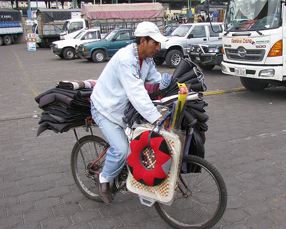 guy-on-bike-with-merchandise_3127