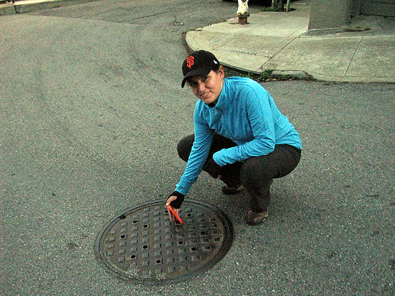 As we were heading home in falling dusk, we crossed this manhole at Romain and Douglass, and heard a rushing stream below, one of many emerging from artesian springs around the eastern slopes of Twin Peaks. Adriana got it on her phone...