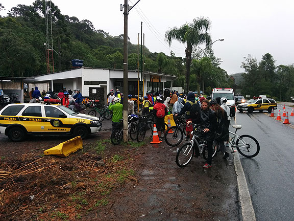 Arbitrary petty authority by the Brazilian federal police held our ride up for two hours at the head of the road. No laws were in play, just the opinion of a couple of cops who thought they had the right to ban bicyclists from making the ride down the hill! They finally relented.