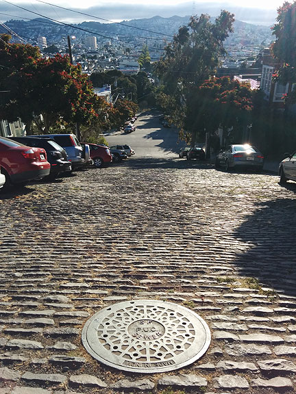 This and other manholes like it are on 24th Street just below Starr King open space where there are still cobblestones!