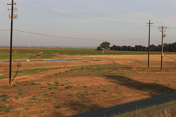 A view of the intake machinery where the Cross Canal begins just across the levee from the Sacramento River.