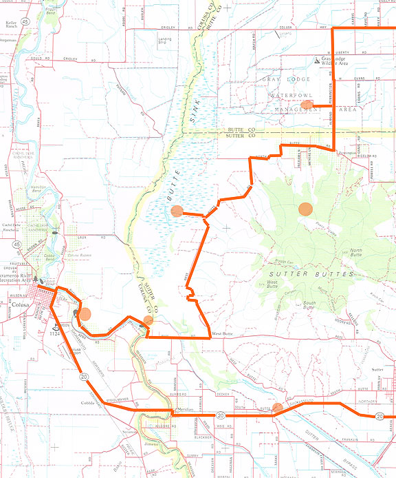 West on 20 we made our way quickly to Colusa, and then we meandered for several hours along Butte Road, in the shadow of the magnificent Sutter Buttes (orange spot). We took a short jog into the heart of the Butte Sink only to find a very parched, utterly dried up swamp. The circles are in the middle of the Sutter Bypass along Highway 20, at the juncture of Butte Slough and the Sacramento River, in the Butte Sink. and the Gray Lodge managed wetlands.