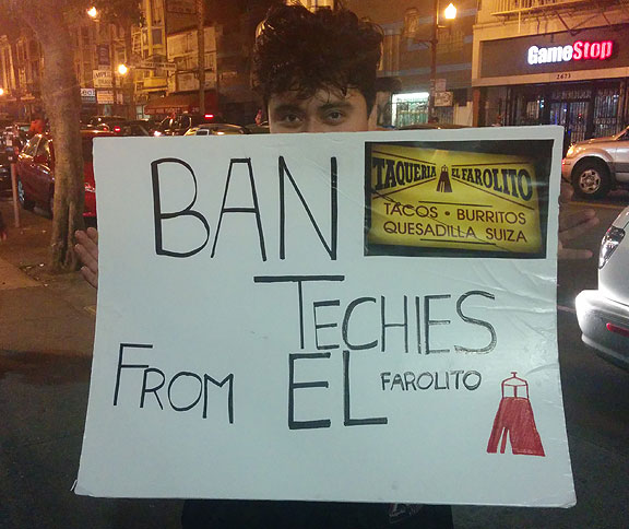 During the wild celebration last night in the Mission (after the Giants won their way into the World Series for the 3rd time in 5 years), this guy was protesting amidst the fun...