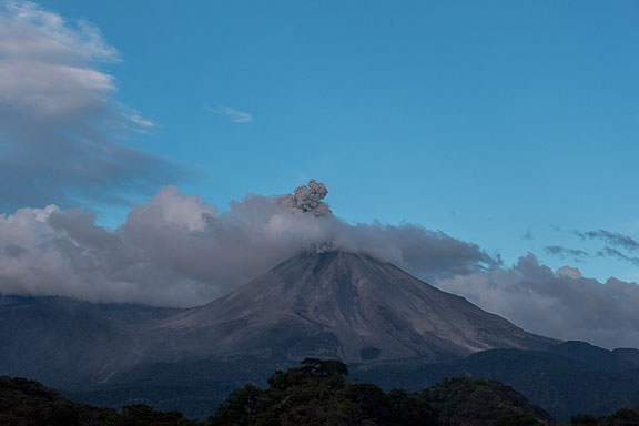 Adriana and I had our backs to the volcano and Ale was taking our picture when she suddenly exclaimed, "Look! Look!"