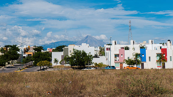 We drove north out of Colima past these modern housing projects, but with our thoughts on the volcano looming in the distance.
