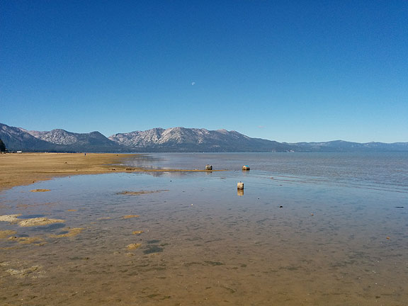 I caught the moon over the western hills along the beach at South Lake Tahoe, rather sad in its depleted state after 3 years of drought.