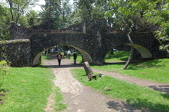 The Paseo del Rio, now a cobble-stoned street alongside this winding park covered by 18th century stone bridges, was once an actual river.
