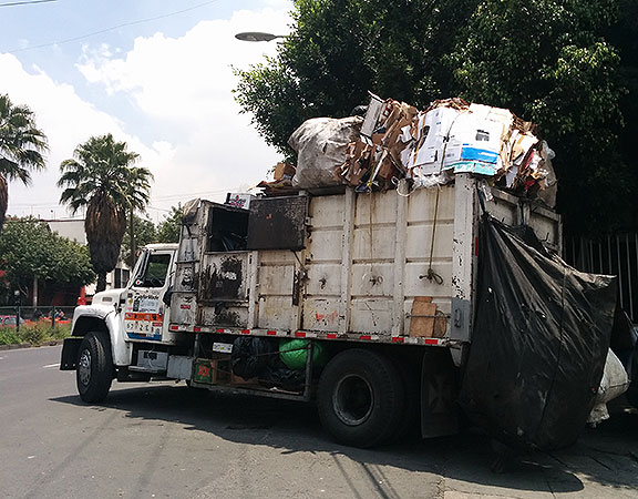 Impossible to understand how the thousands of garbage trucks manage to move the thousands of tons of waste out of the city every day...